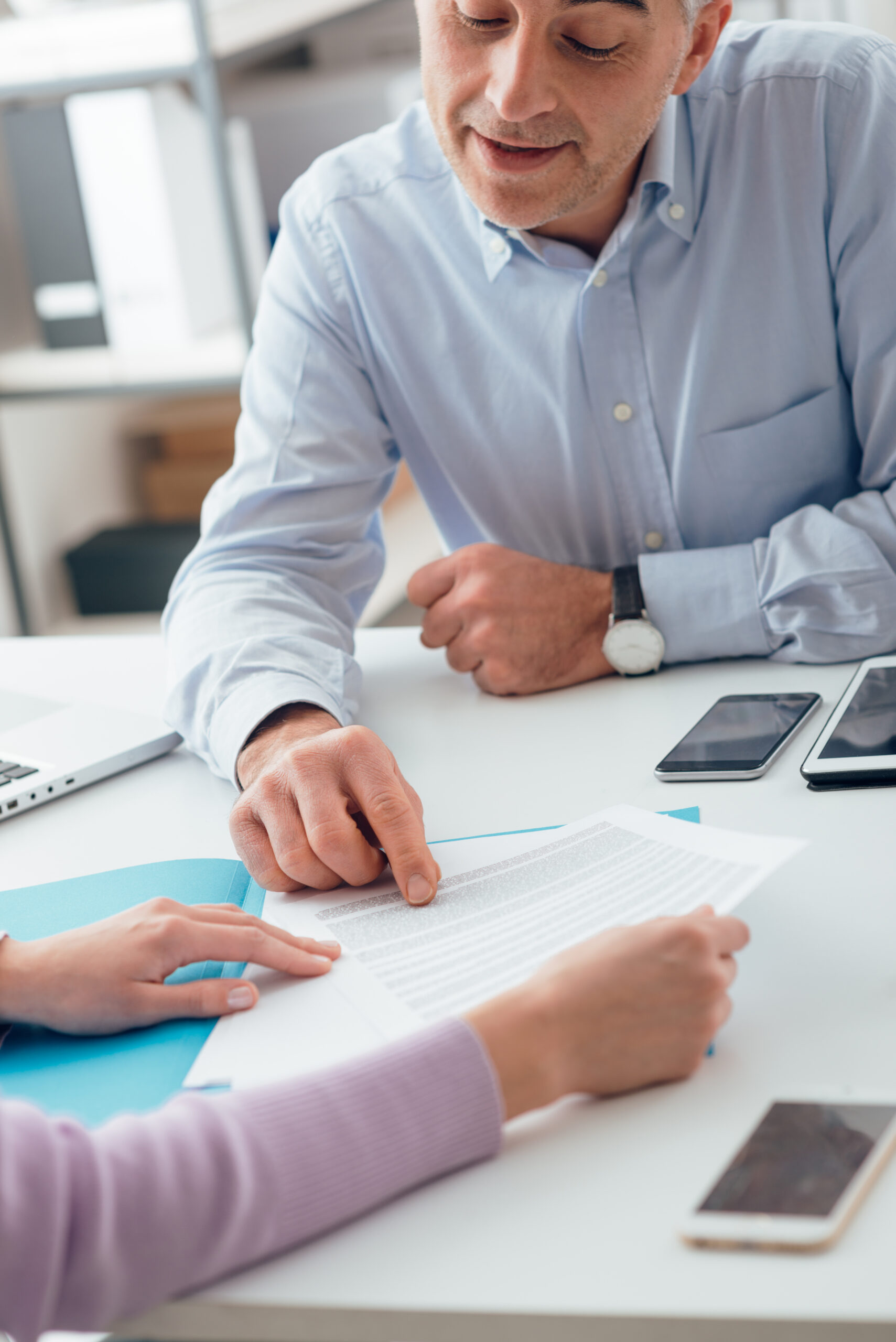 Young,Woman,Having,A,Business,Meeting,With,An,Executive,In